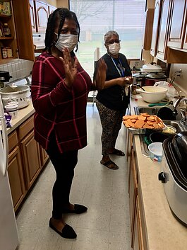 Tenant leaders at Tall Oaks Apartments give back to their fellow residents with home-cooked meals.