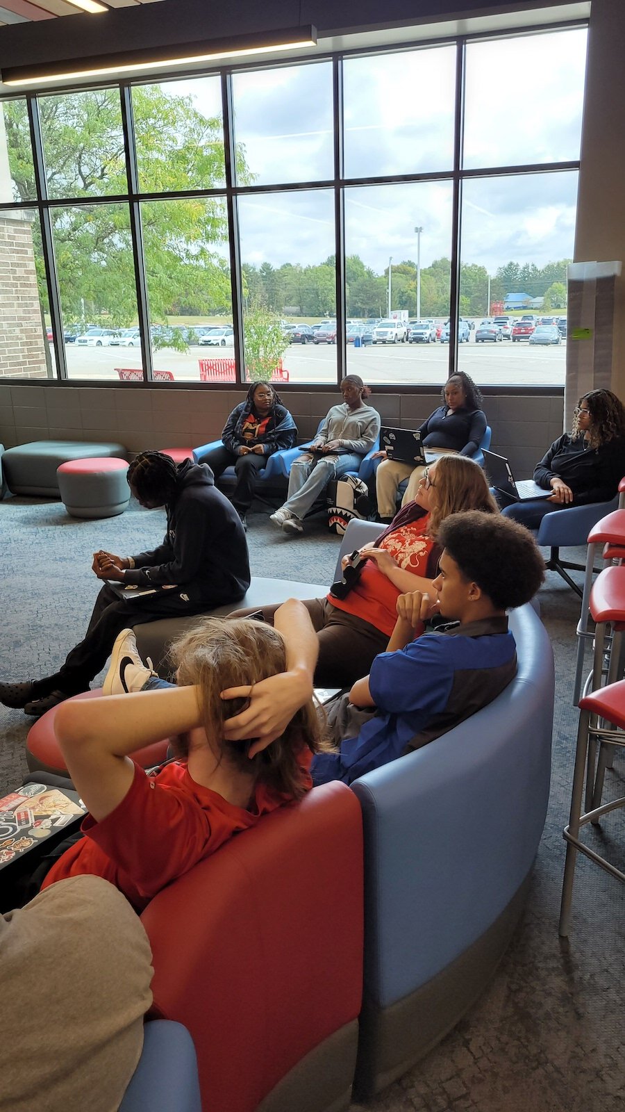 Students listen to their peers present during their Rock the Vote program. 