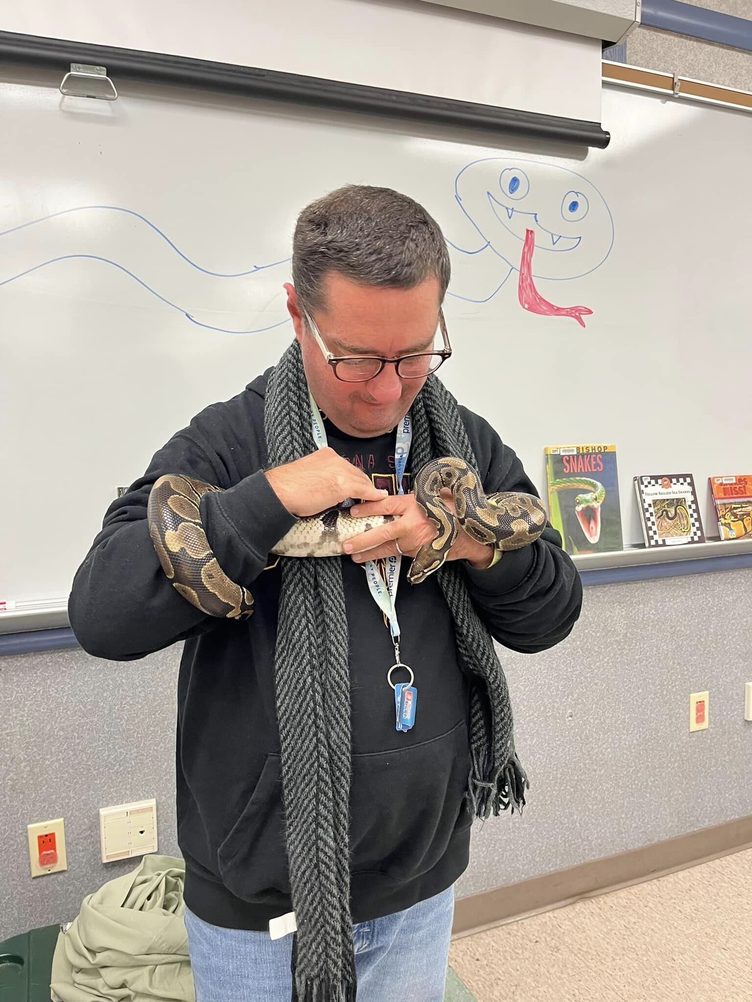 Sometimes the All Abilities Club has animal visitors, like snakes, which gives people the opportunity to hold and learn about the animals.