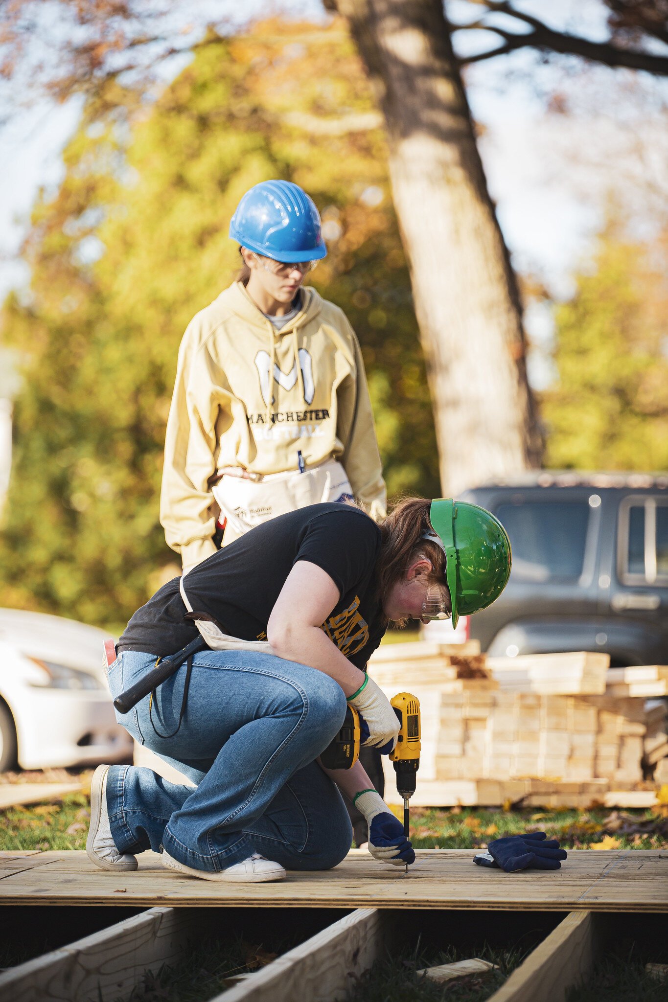 Manchester University students volunteer at a Habitat for Humanity event in Wabash County.