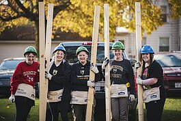 Manchester University students volunteer at a Habitat for Humanity event in Wabash County.