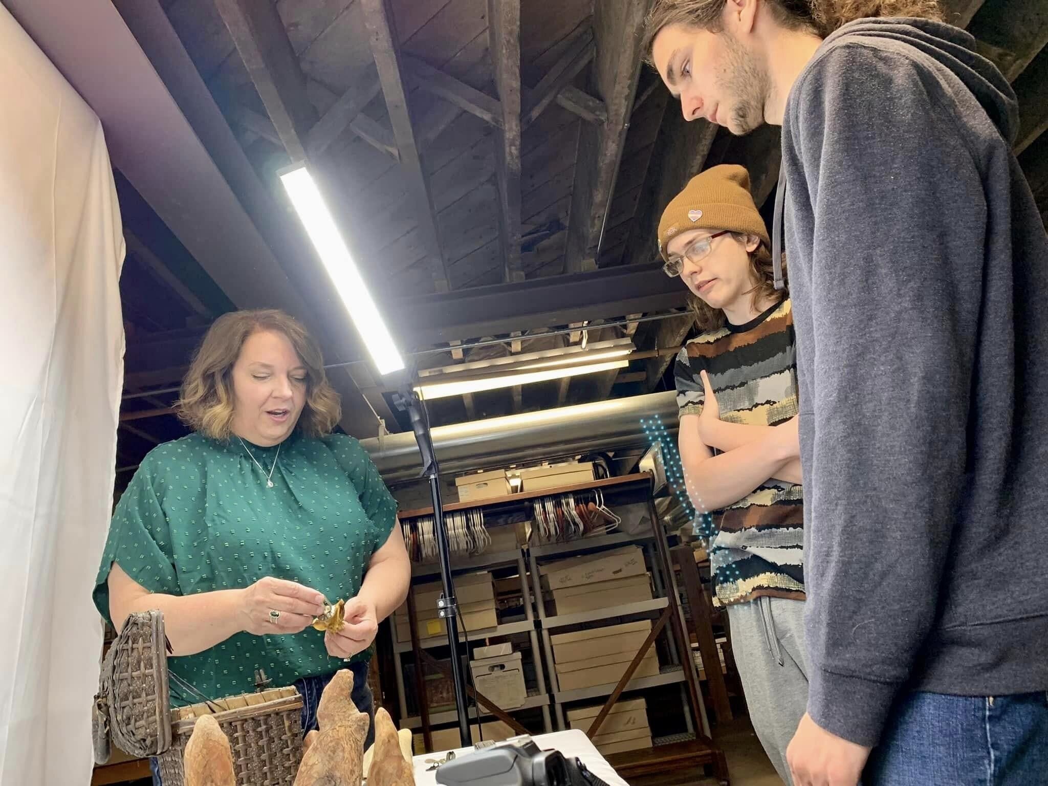 Teresa Galley, executive director Wabash County Museum, with archivists interns in the Wabash County Museum archives.