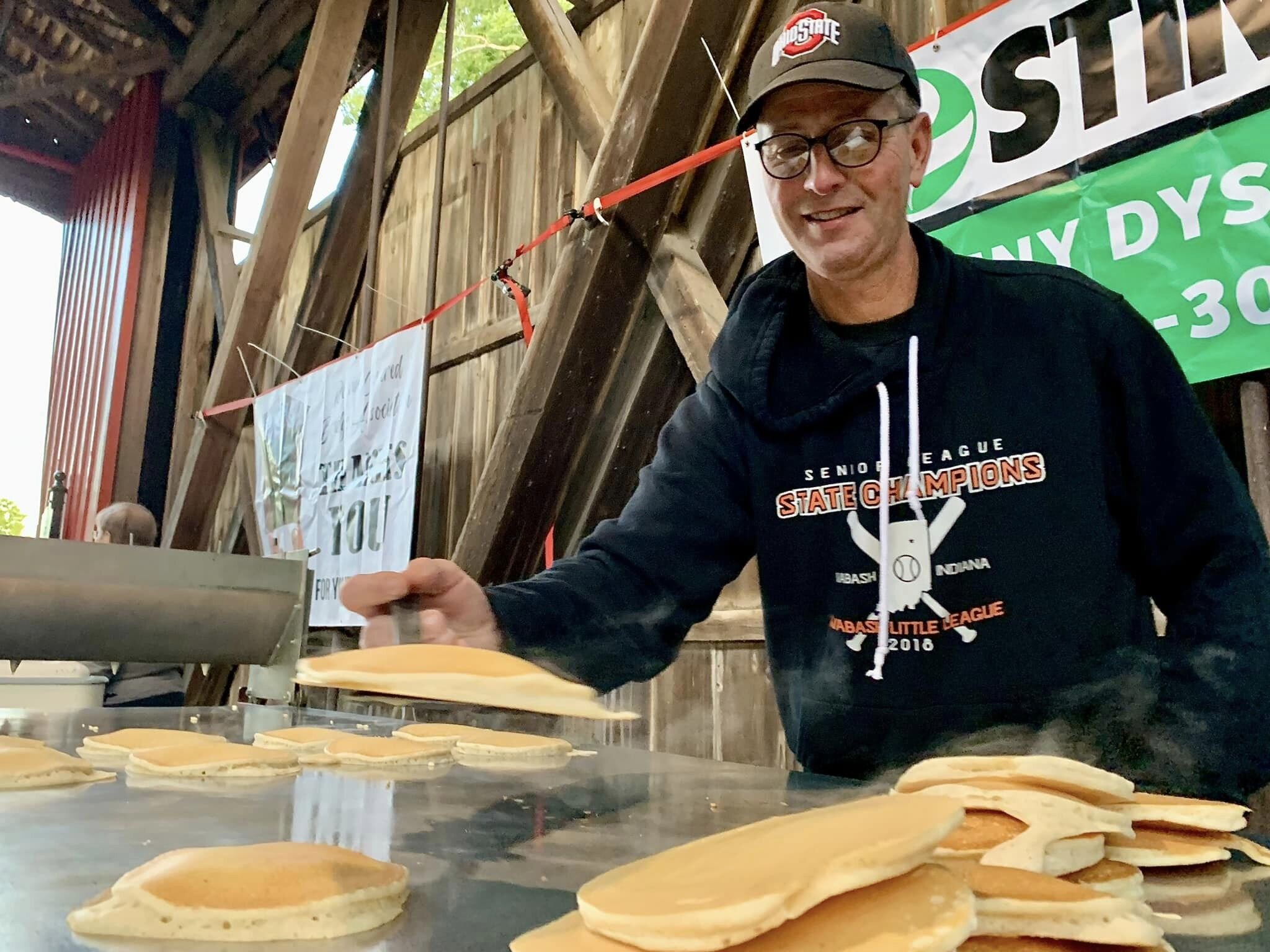 Pancakes being prepared during the Pancake Breakfast during the Roann Covered Bridge Festival.