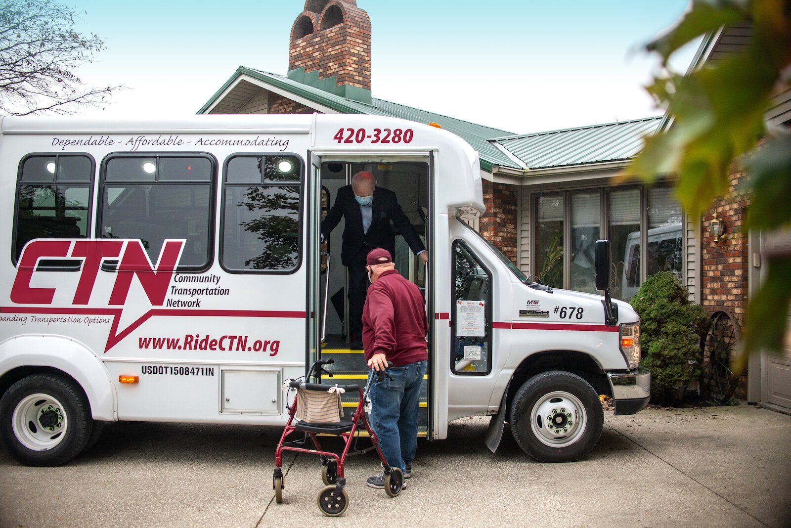 A passenger makes their off a CTN bus.