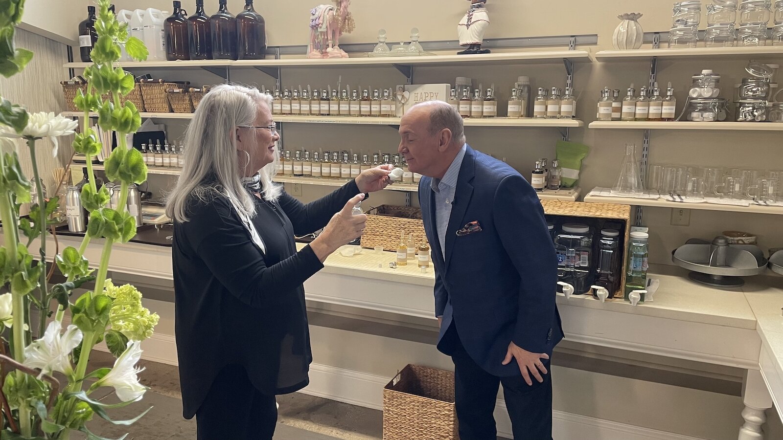 A customer tests a scent from A studio tour at Annie Oakley Natural Perfumery.