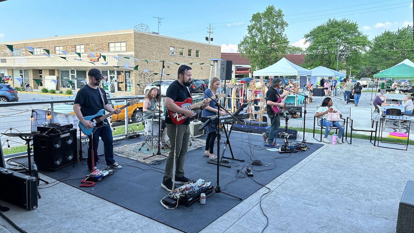 A band performing at The Garden's Night Market