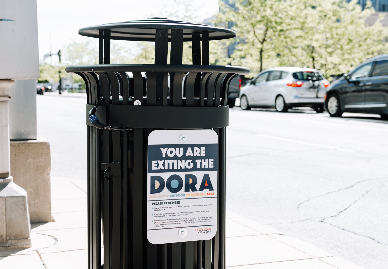 A sign at Wayne St. and Calhoun St. in downtown Fort Wayne warns people they are exiting the Designated Outdoor Refreshment Area (DORA).