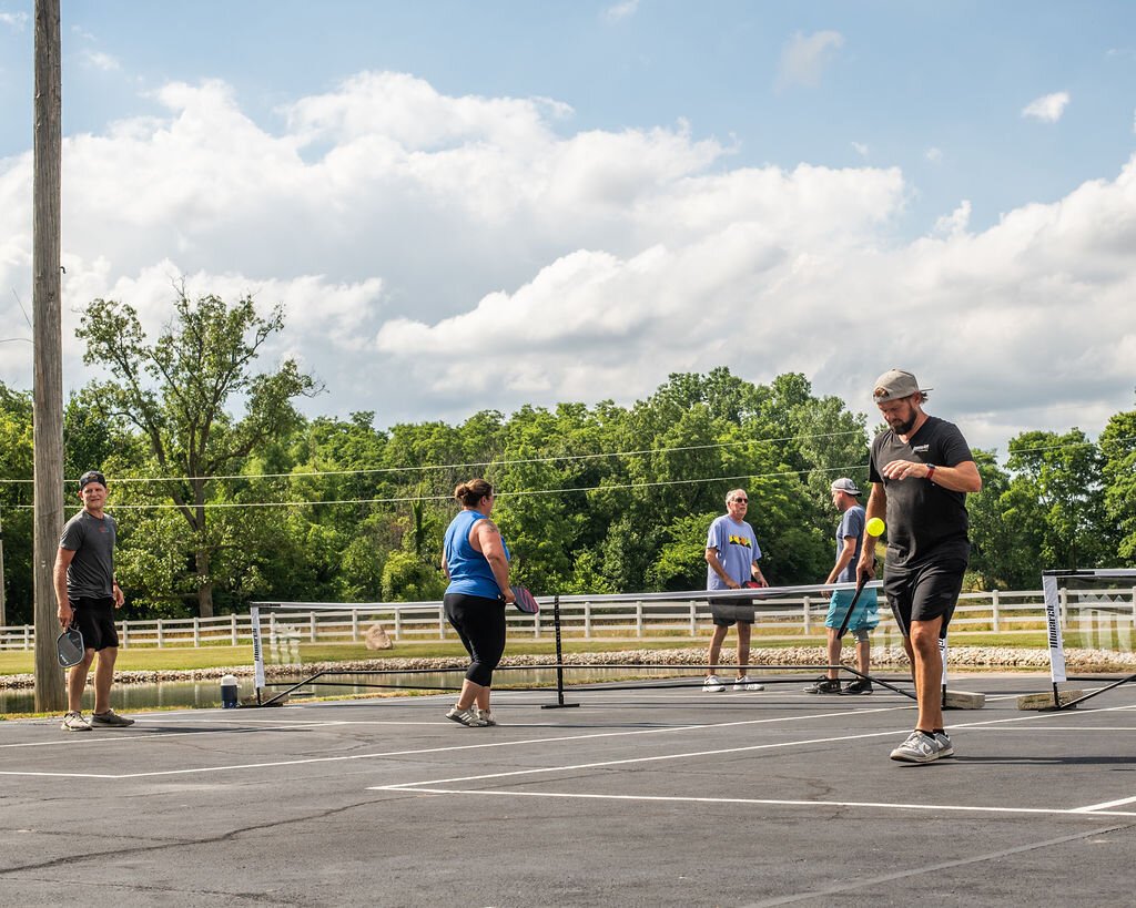 Friends gather to play at Hileman Farms, which features 5 private pickleball courts.