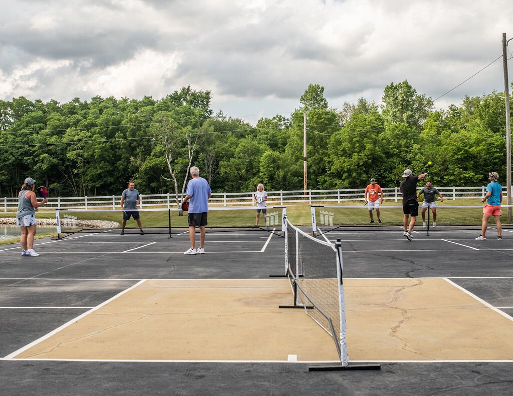 Friends gather to play at Hileman Farms, which features 5 private pickleball courts.