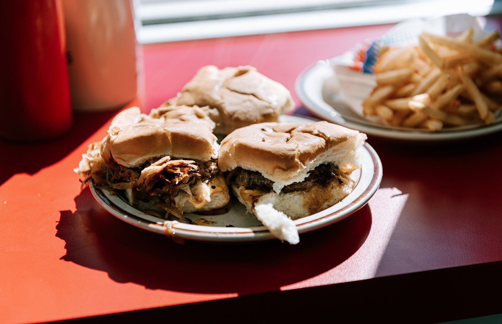 Powers is known for their slider hamburgers, which are topped with onion.