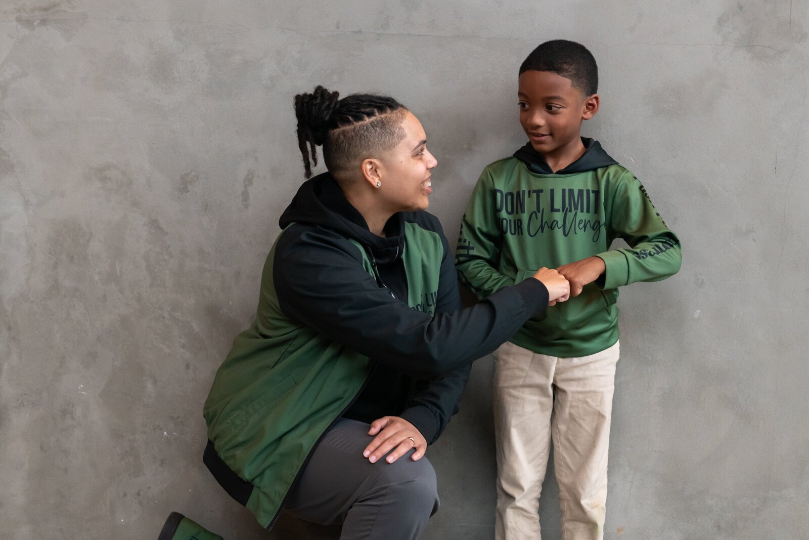 Tori Grieser, founder of Push for Progress, with Ja'Maire Frison, 7, sporting items from the Fearless Collection.