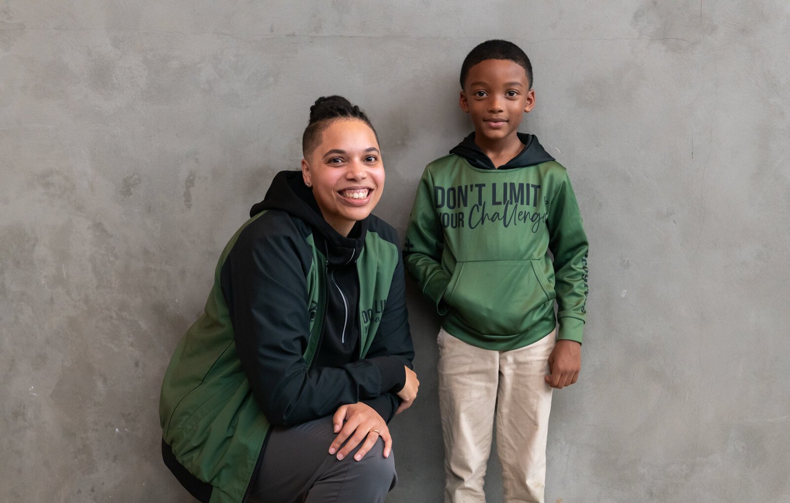 Tori Grieser, founder of Push for Progress, with Ja'Maire Frison, 7, sporting items from the Fearless Collection.