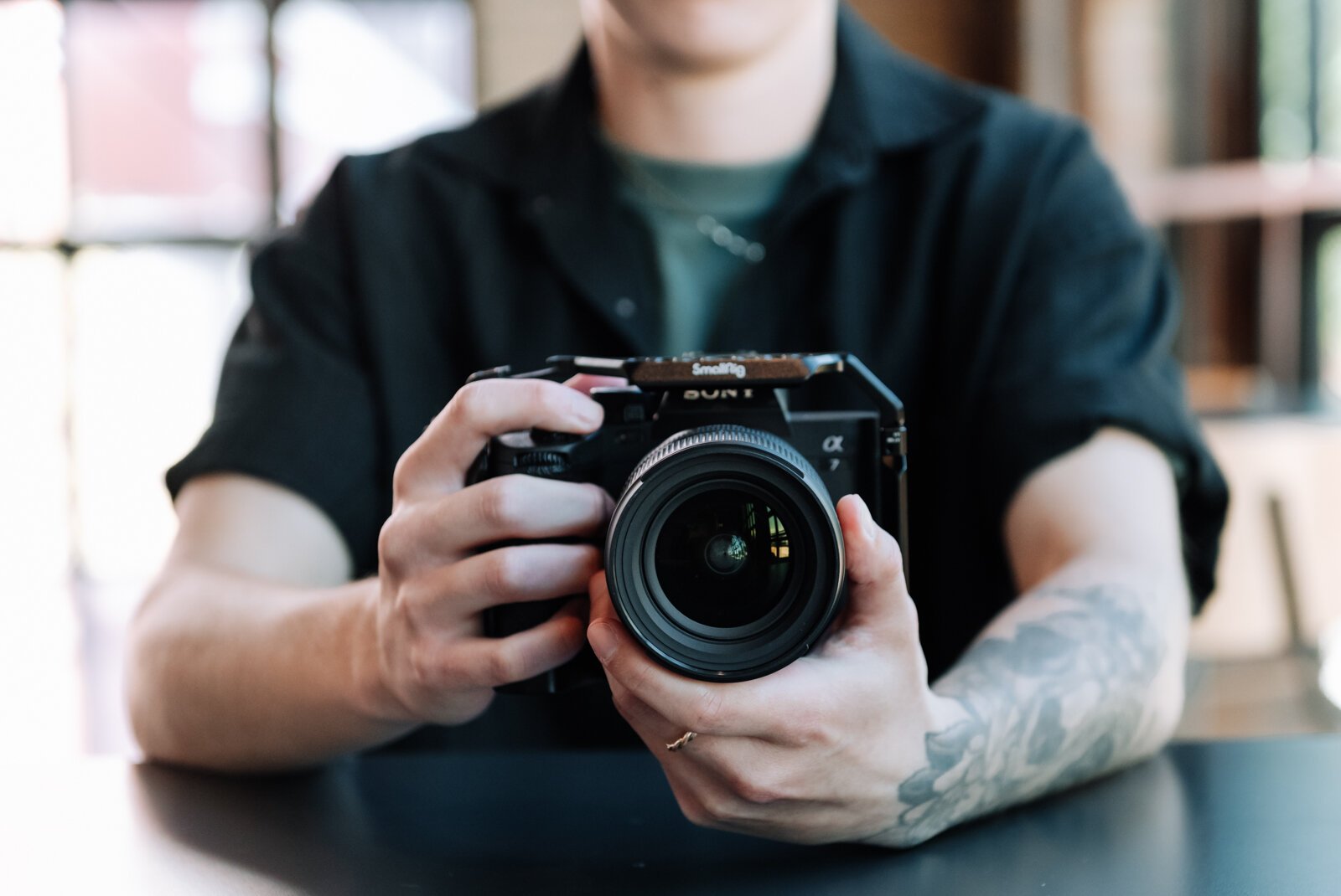 Content creator McKayla Nevers takes a photo at Electric Works.