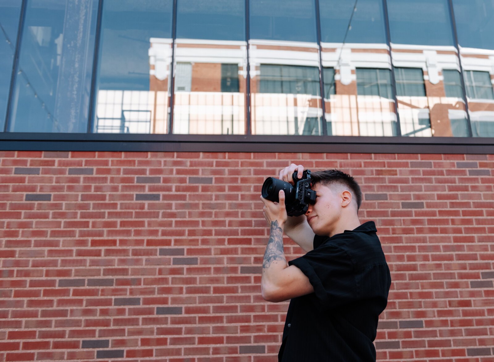 Content creator McKayla Nevers takes a photo at Electric Works.