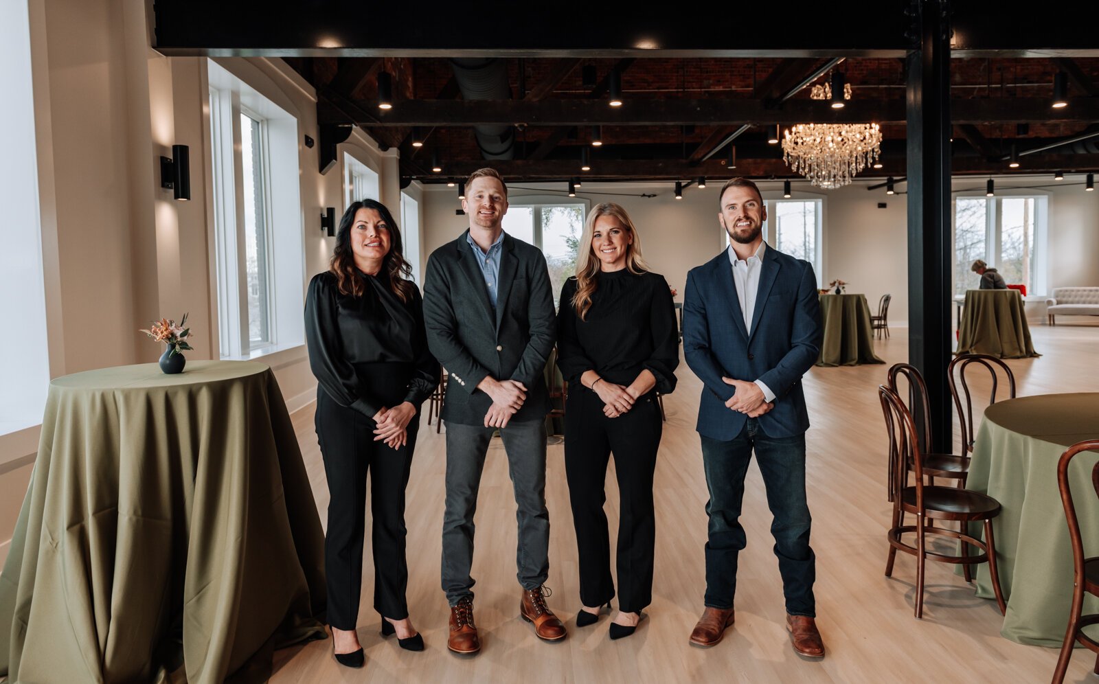 From left: Wedding and Events Manager Kelly Geiser, Owner Nathan Newport, General Manager Nicole Derheimer, and Owner David Beer on the 3rd floor at The Fairfield.