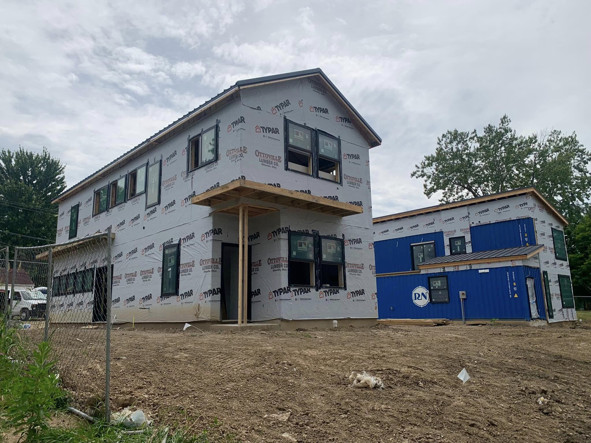 The Houm and Three Squared Houses under construction.