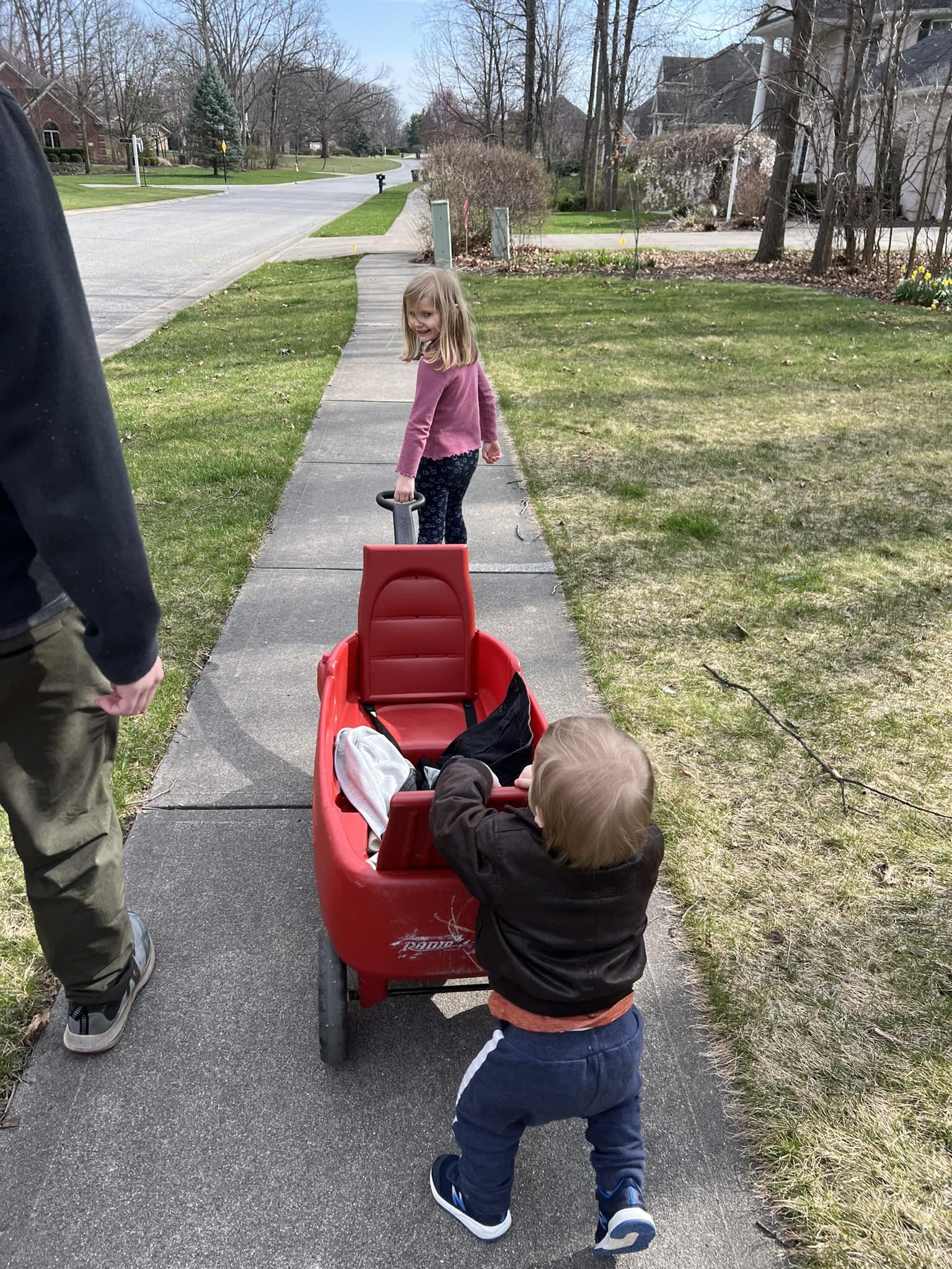 A YLNI board member and her family on an evening walk with the goal of picking up 200 pieces of trash over the course of the year.