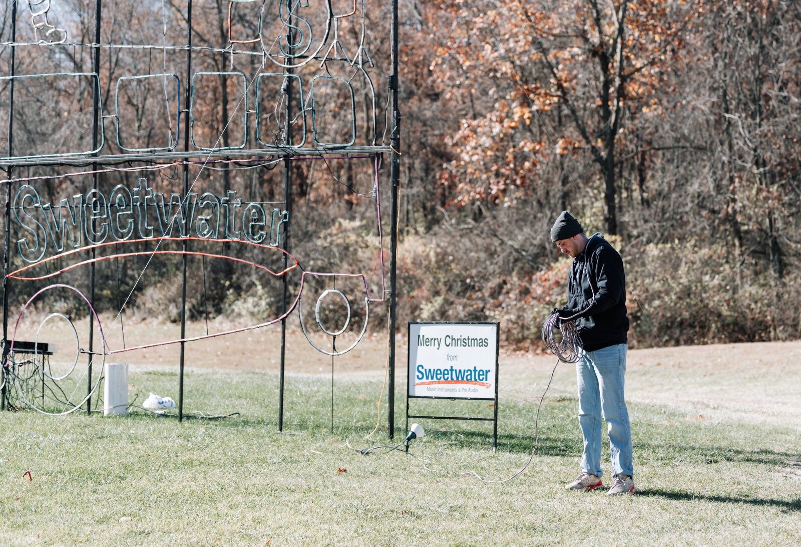 Connor West helps with an extension cord while setting up lights at Blue Jacket's Fantasy of Lights.