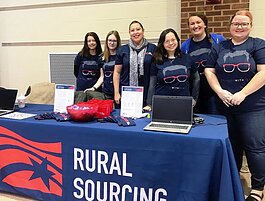 Colleagues at Rural Sourcing Inc.'s Fort Wayne Development Center support local tech talent initiatives like the Girl Scouts STEM Conference.