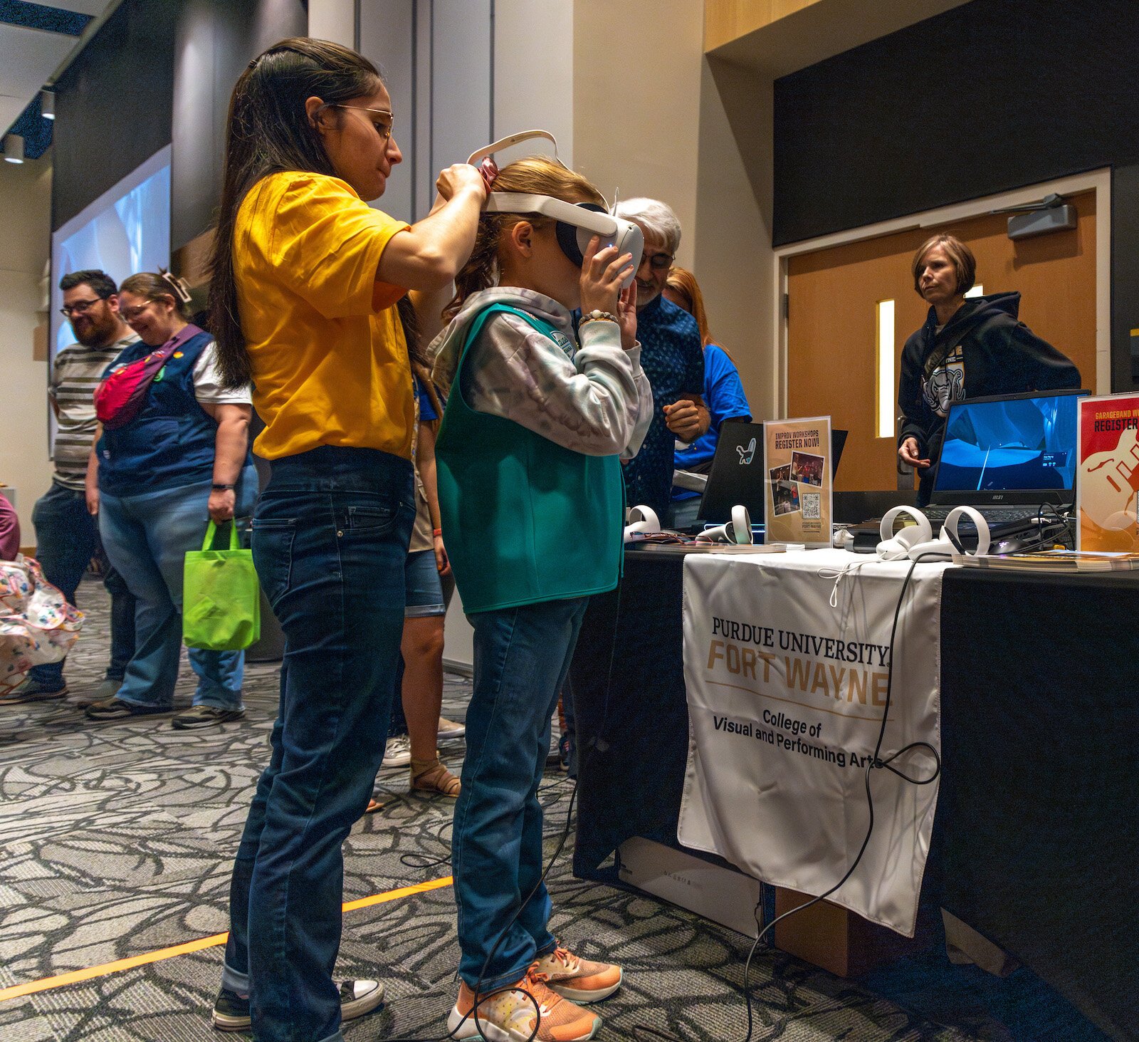 A Girl Scout experience virtual reality technology at the STEM Expo. 