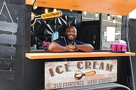 Tony Belton inside The Scoop Hitchen, a trailer that he converted to serve ice cream out of.