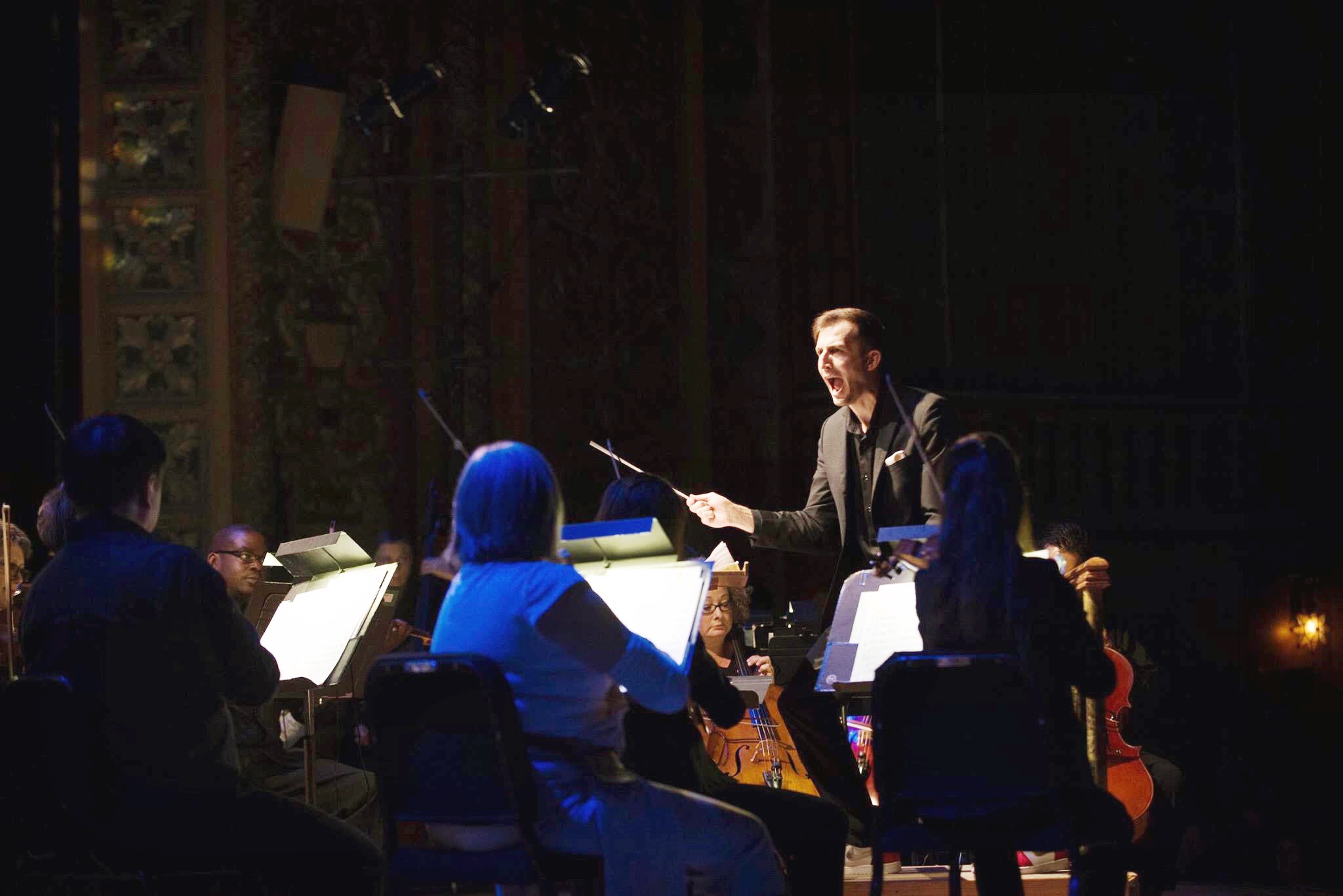 Caleb Young is the Staff Conductor of the Fort Wayne Philharmonic.